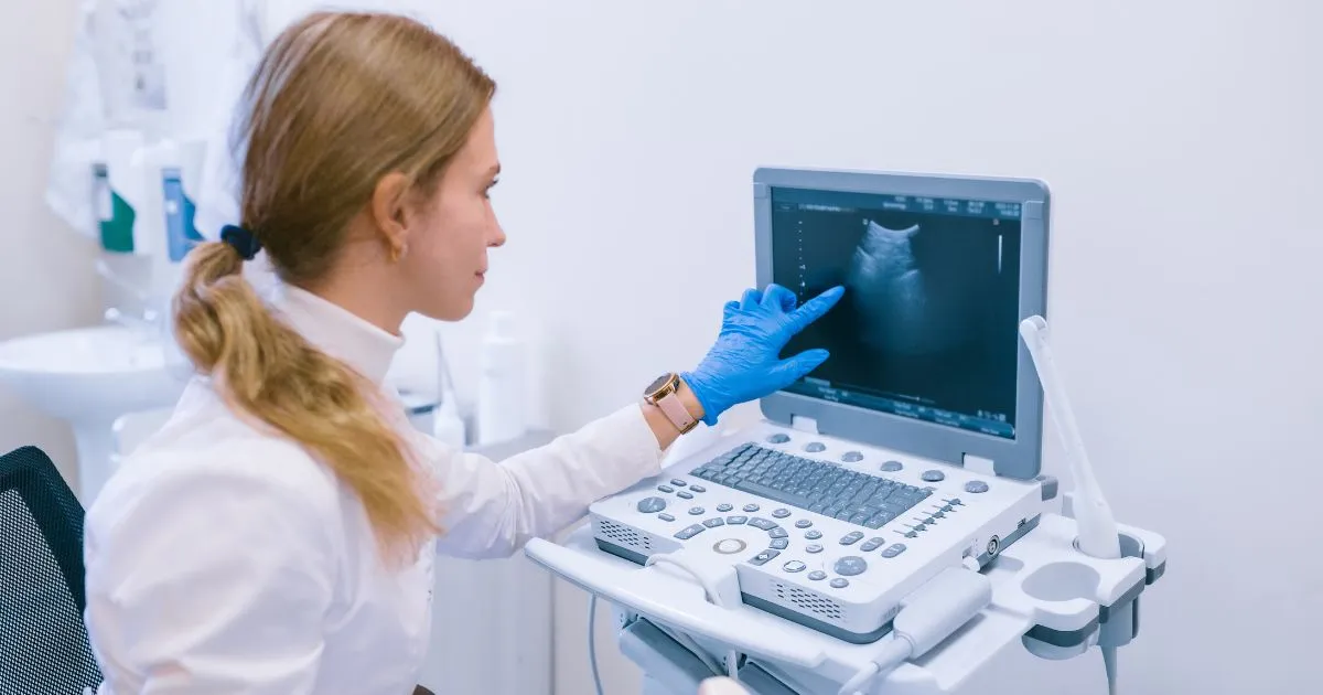 Doctor reviews ultrasound imaging results at a medical clinic in Medford, OR